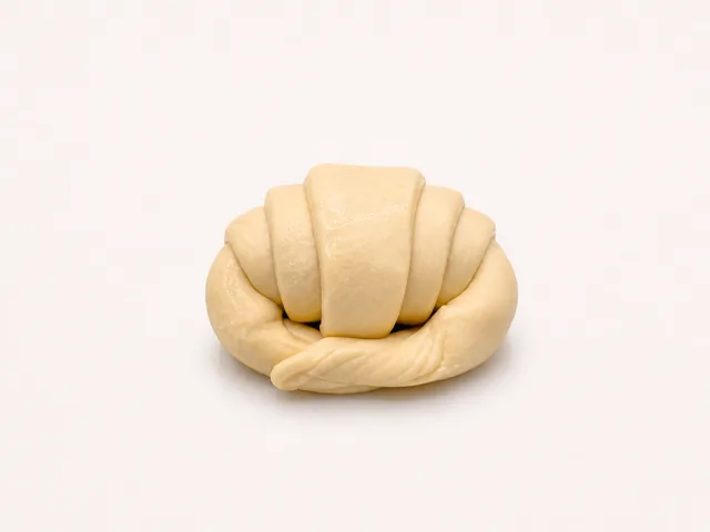 Croissant curvo de mantequilla